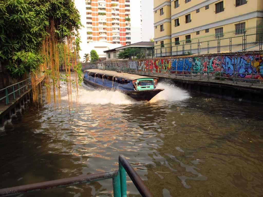 water taxi speeding on a canal